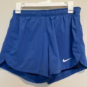 Blue Nike running shorts with lining